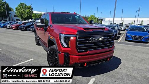 Volcanic Red Tintcoat 2026 GMC Sierra 2500 AT4