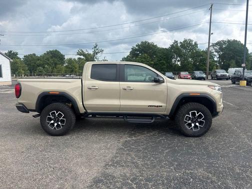 Desert Sand Metallic 2023 GMC Canyon AT4X