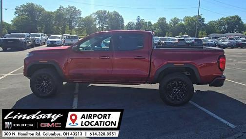 Volcanic Red Tintcoat 2026 GMC Canyon Elevation