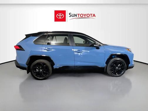 Cavalry Blue/Midnight Black Metallic 2024 Toyota RAV4 Hybrid SE