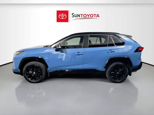 Cavalry Blue/Midnight Black Metallic 2024 Toyota RAV4 Hybrid SE