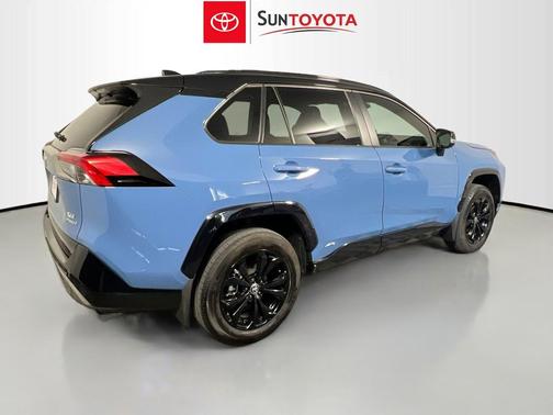 Cavalry Blue/Midnight Black Metallic 2024 Toyota RAV4 Hybrid SE