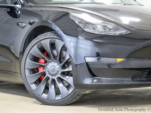 Solid Black 2023 Tesla Model 3 Performance