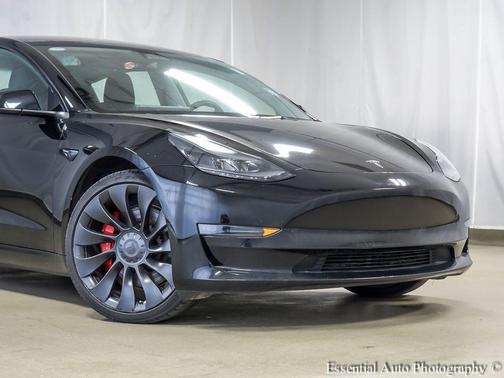 Solid Black 2023 Tesla Model 3 Performance