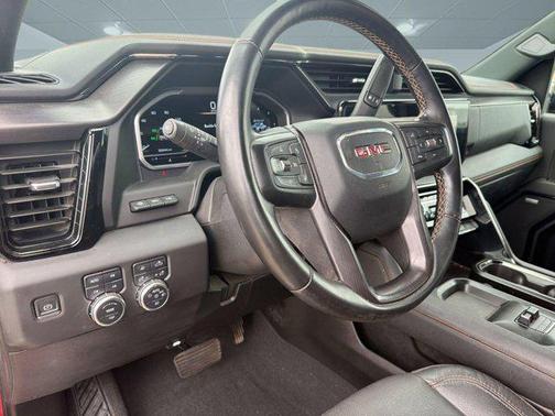 Volcanic Red Tintcoat 2024 GMC Sierra 2500 AT4