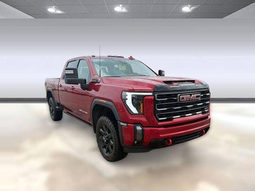 Volcanic Red Tintcoat 2024 GMC Sierra 2500 AT4