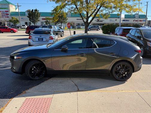 Machine Gray Metallic 2026 Mazda Mazda3 FWD w/Premium Package