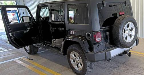 Black 2014 Jeep Wrangler Unlimited Sahara