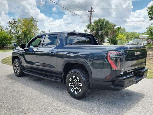 Deep Ocean Metallic 2026 GMC Sierra EV Extended Range Elevation