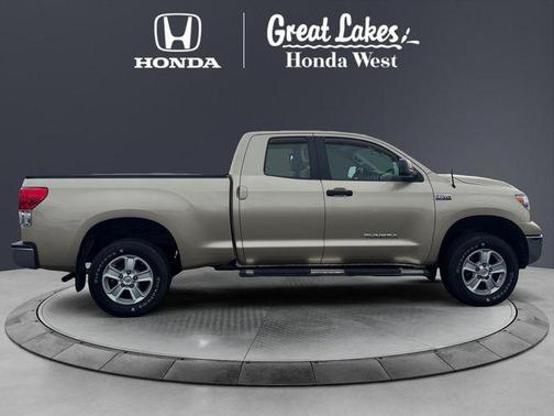 Sandy Beach Metallic 2010 Toyota Tundra Grade