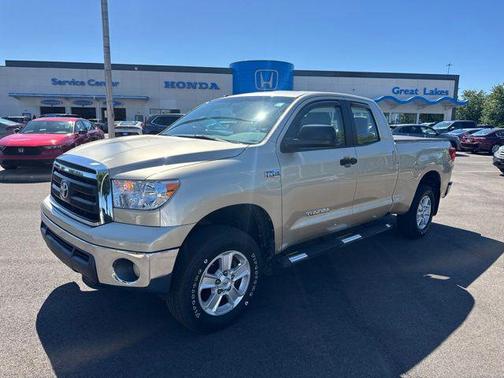 Sandy Beach Metallic 2010 Toyota Tundra Grade