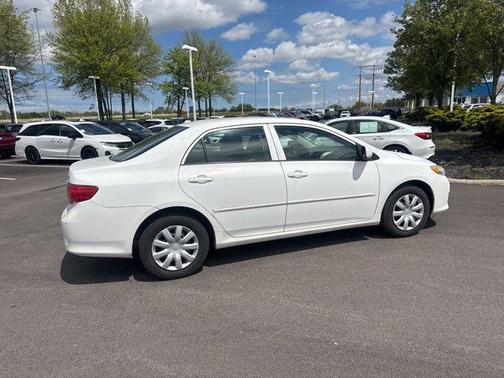 Super White 2010 Toyota Corolla LE