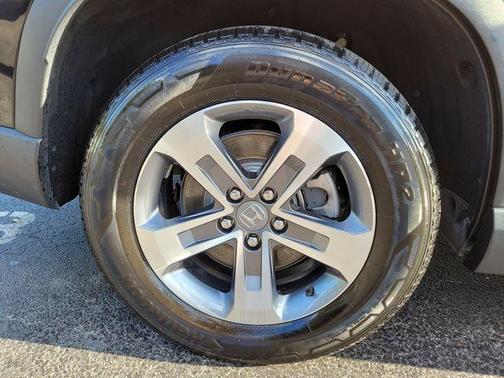 Crystal Black Pearl 2024 Honda Pilot EX-L 7-Passenger