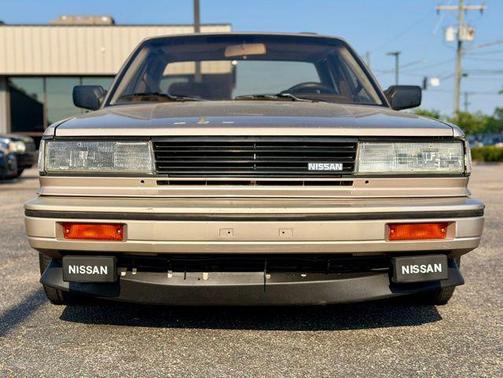 Gold 1987 Nissan Maxima SE