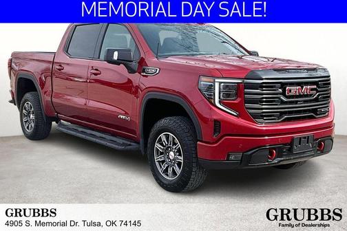 Volcanic Red Tintcoat 2025 GMC Sierra 1500 AT4