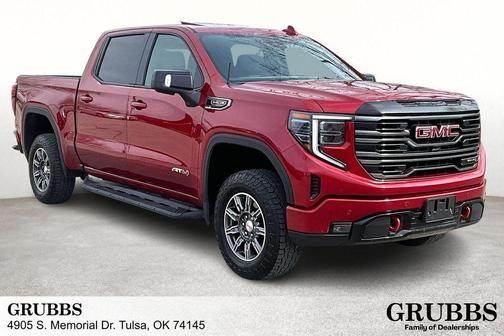 Volcanic Red Tintcoat 2025 GMC Sierra 1500 AT4
