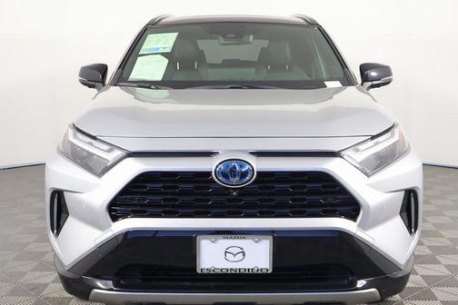 Silver Sky Metallic/Midnight Black Metallic 2023 Toyota RAV4 Hybrid SE