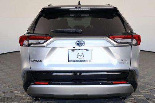 Silver Sky Metallic/Midnight Black Metallic 2023 Toyota RAV4 Hybrid SE