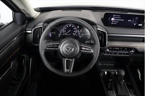 machine gray metallic 2026 Mazda CX-50 Hybrid Premium Plus