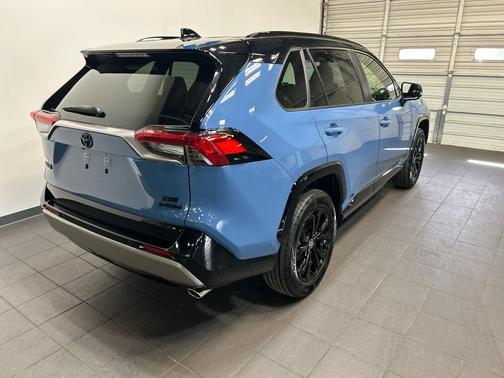 Cavalry Blue/Midnight Black Metallic 2024 Toyota RAV4 Hybrid SE