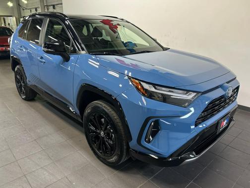 Cavalry Blue/Midnight Black Metallic 2024 Toyota RAV4 Hybrid SE