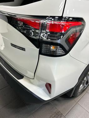 Crystal White Pearl/Crystal Black Silica 2026 Subaru Forester Hybrid Touring