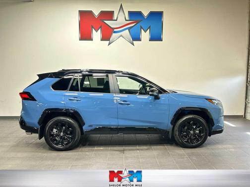 Cavalry Blue/Midnight Black Metallic 2025 Toyota RAV4 Hybrid SE