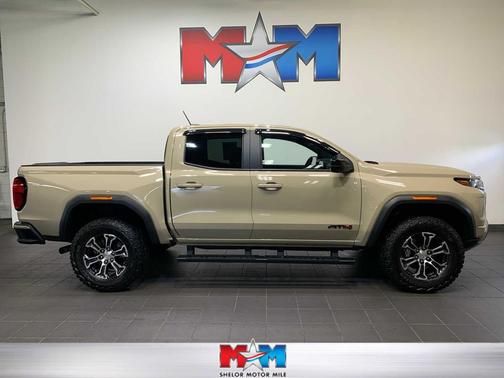 Desert Sand Metallic 2023 GMC Canyon AT4