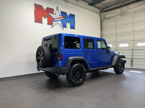 Hydro Blue Pearlcoat 2016 Jeep Wrangler Unlimited Black Bear