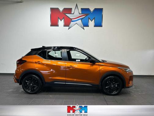 Monarch Orange Metallic/Super Black 2023 Nissan Kicks SR