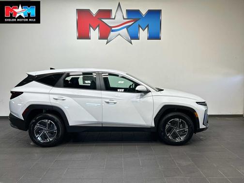 Creamy White Pearl 2026 Hyundai TUCSON Hybrid Blue SE