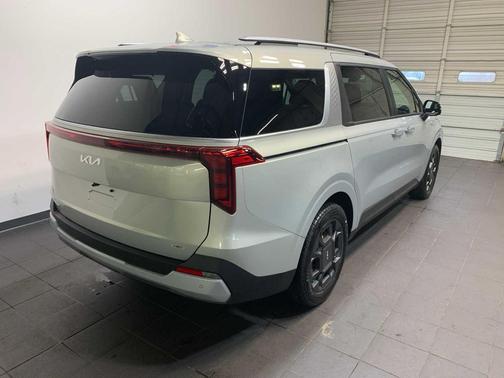 Ivory Silver 2026 Kia Carnival Hybrid EX
