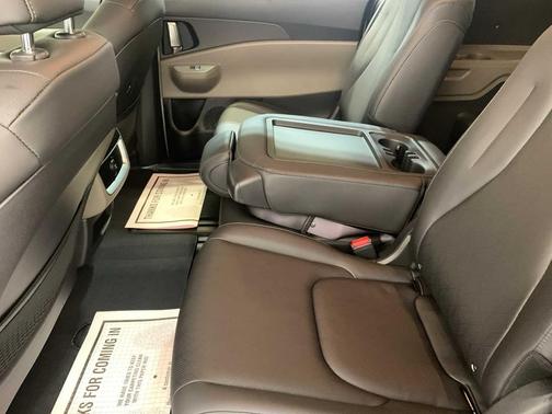 Ivory Silver 2026 Kia Carnival Hybrid EX