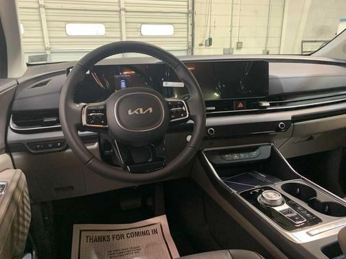 Ivory Silver 2026 Kia Carnival Hybrid EX