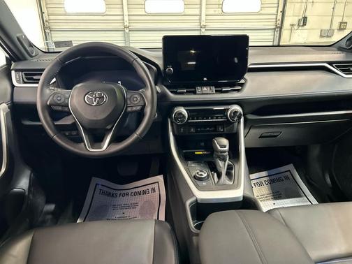 Silver Sky Metallic/Midnight Black Metallic 2024 Toyota RAV4 Hybrid SE
