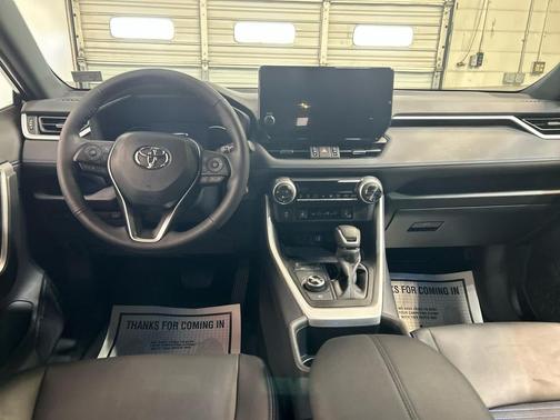Silver Sky Metallic/Midnight Black Metallic 2025 Toyota RAV4 Hybrid SE