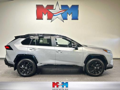 Silver Sky Metallic/Midnight Black Metallic 2025 Toyota RAV4 Hybrid SE