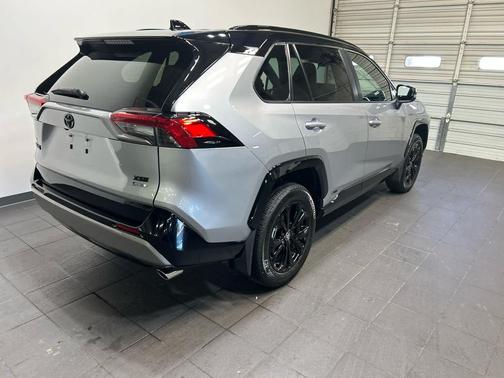 Silver Sky Metallic/Midnight Black Metallic 2025 Toyota RAV4 Hybrid SE