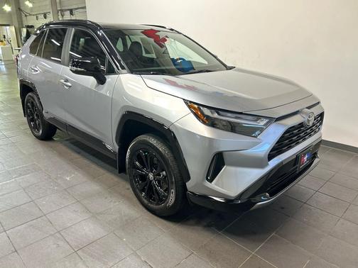 Silver Sky Metallic/Midnight Black Metallic 2025 Toyota RAV4 Hybrid SE