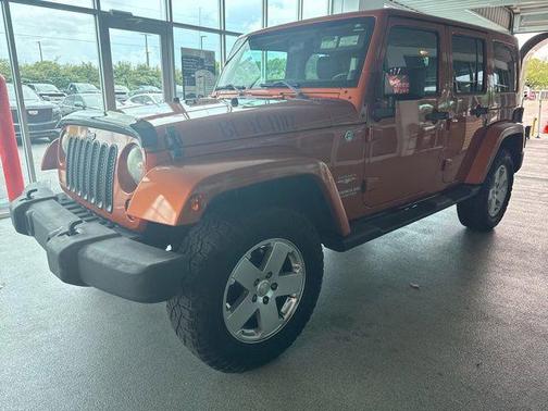 Mango Tango Pearlcoat 2011 Jeep Wrangler Unlimited Sahara