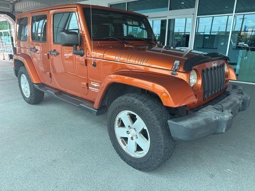Mango Tango Pearlcoat 2011 Jeep Wrangler Unlimited Sahara