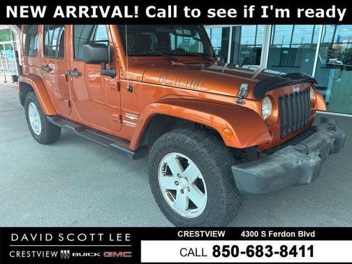 Mango Tango Pearlcoat 2011 Jeep Wrangler Unlimited Sahara
