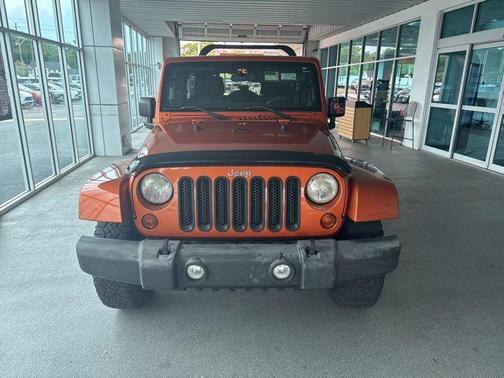 Mango Tango Pearlcoat 2011 Jeep Wrangler Unlimited Sahara