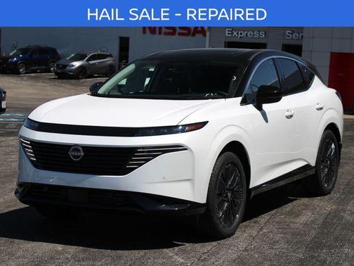 Everest White Pearl Tricoat/Super Black 2026 Nissan Murano Platinum