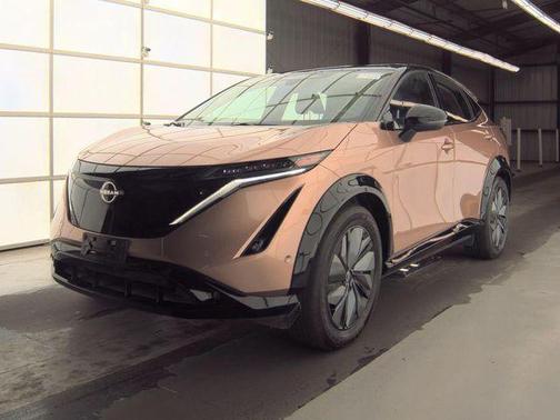 Sunrise Copper Pearl/Black Diamond Pearl 2024 Nissan ARIYA PLATINUM+