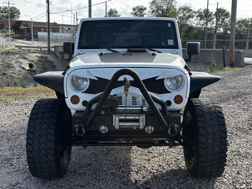 White 2010 Jeep Wrangler Unlimited Sport
