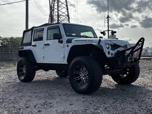 White 2010 Jeep Wrangler Unlimited Sport