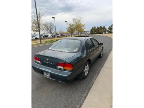 Teal 1999 Nissan Maxima