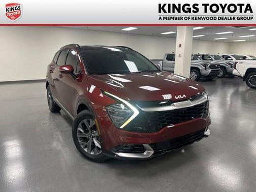 Dawning Red 2025 Kia Sportage Hybrid SX-Prestige