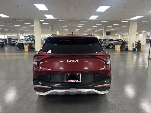 Dawning Red 2025 Kia Sportage Hybrid SX-Prestige